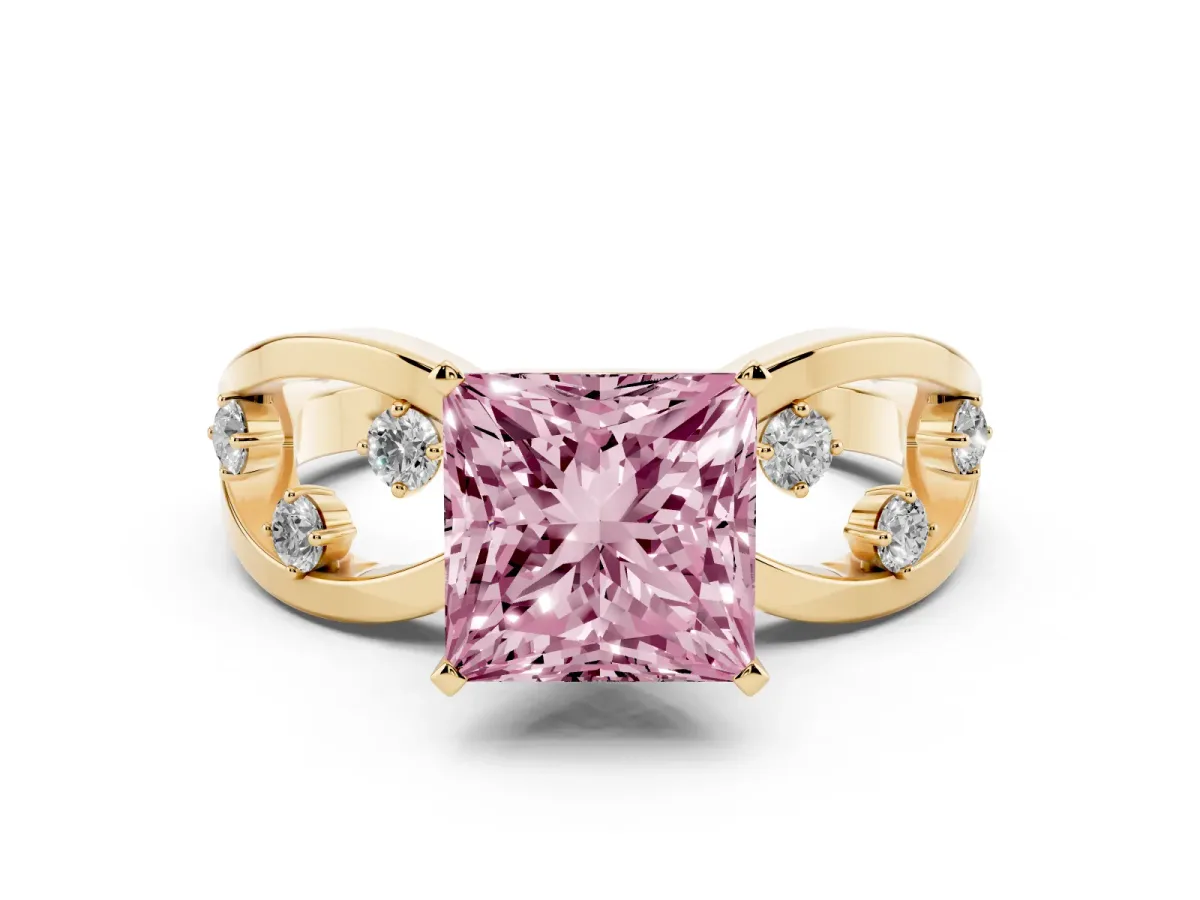 Fancy Pink Princess Cut Cut Solitaire Diamond with Side Stones on Criss-Cross Band and Four-Prong Setting Yellow gold