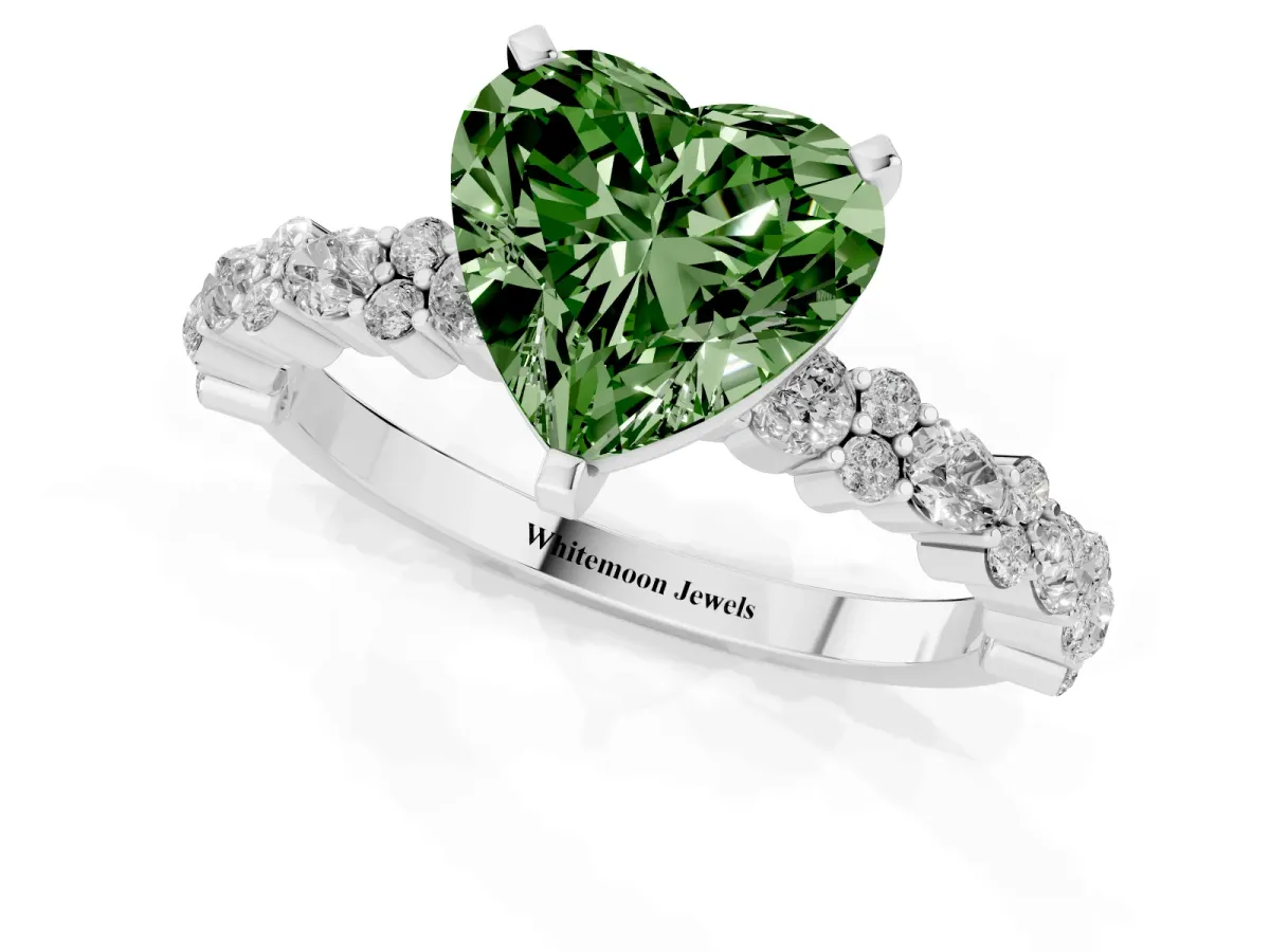 Fancy Green Heart Cut Diamond Side Stone Solitaire Ring with Round and Four-Prong Setting Silver