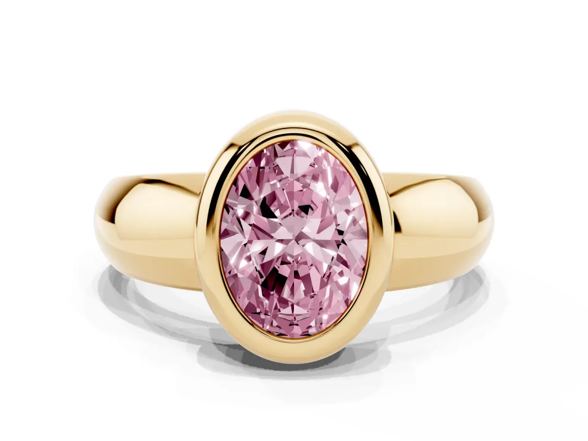 Fancy Pink Bezel Set Oval Cut Solitaire Ring with Wide Band Yellow gold