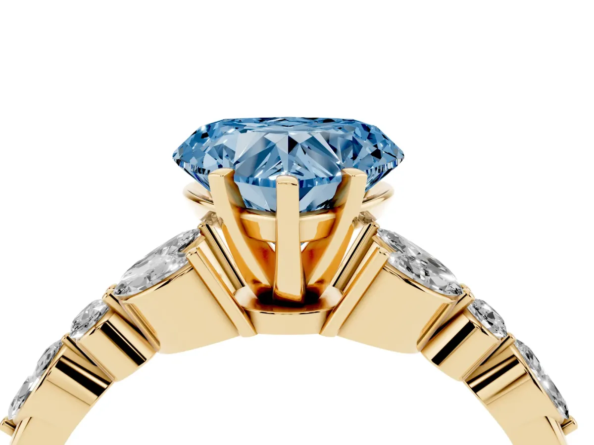 Fancy Blue Heart Cut Diamond Solitaire Ring with Side Stones and Four-Prong Setting Yellow gold