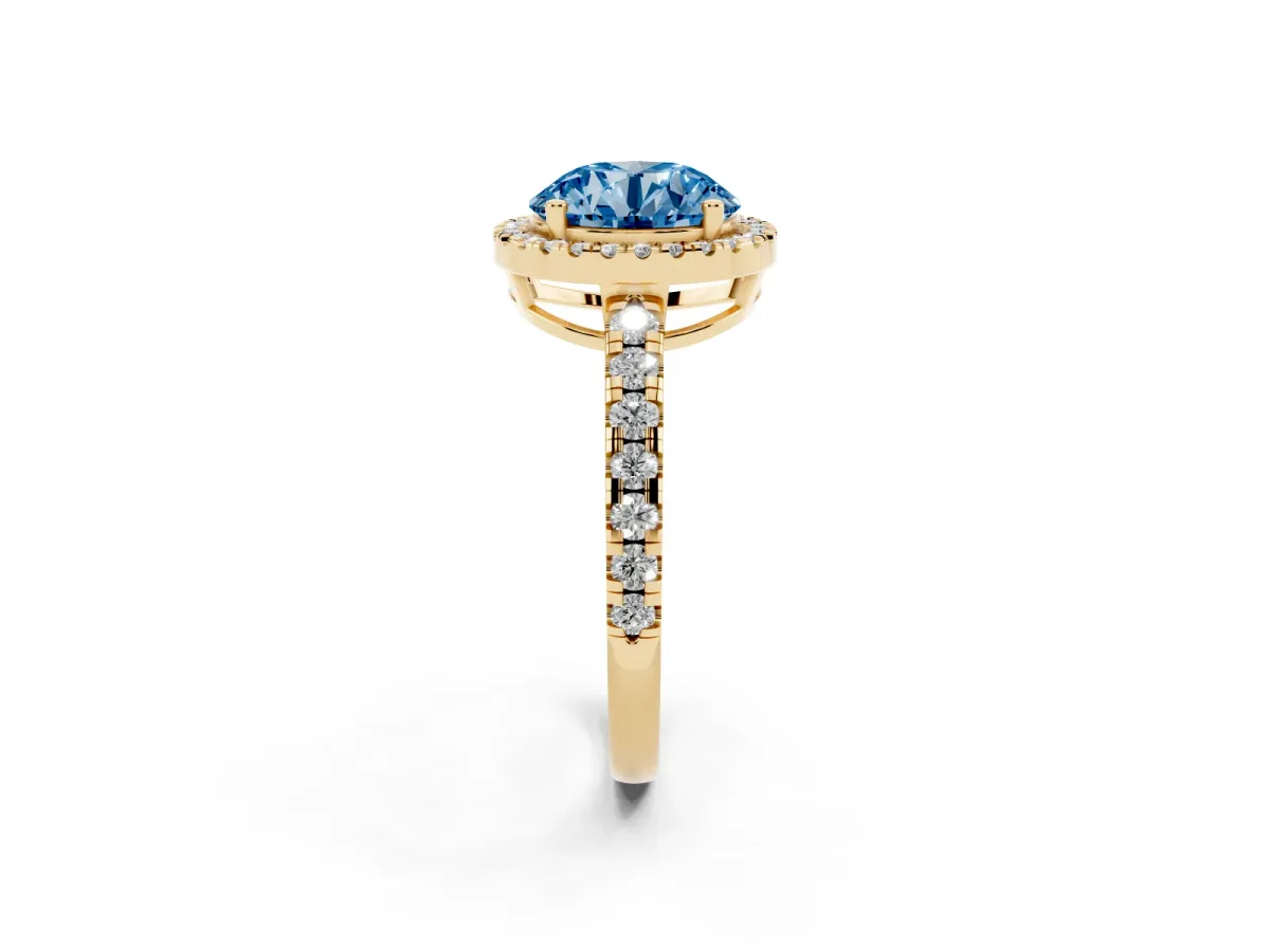 Fancy Blue Round Cut Diamond Halo Ring with Pavé Band and Four-Prong Setting Yellow gold