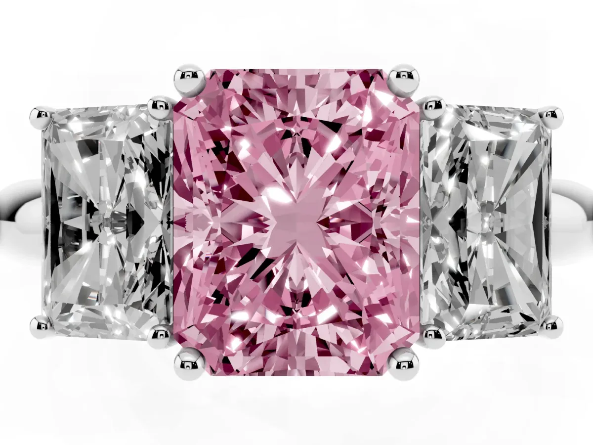 Fancy Pink Three-Stone Radiant Cut Cut Diamond Engagement Ring with Prong Setting on a White Gold Band Platinum