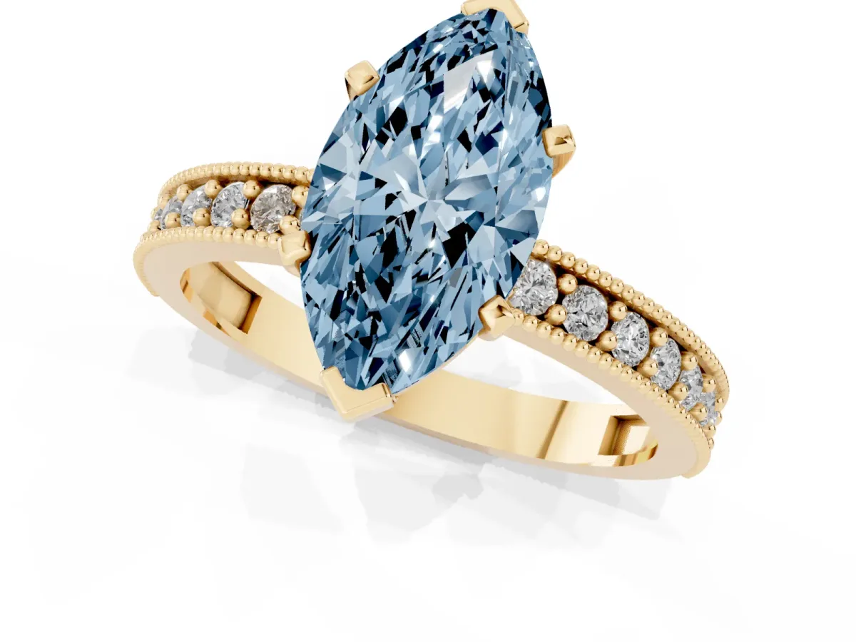 Fancy Blue Marquise Cut Diamond Milgrain Pavé Engagement Ring with Four-Prong Setting Yellow gold