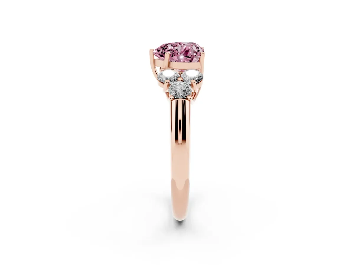 Fancy Pink Heart Cut Cut Diamond Cluster Ring with Round Accent Stones and Prong Setting on a Classic Band Rose gold