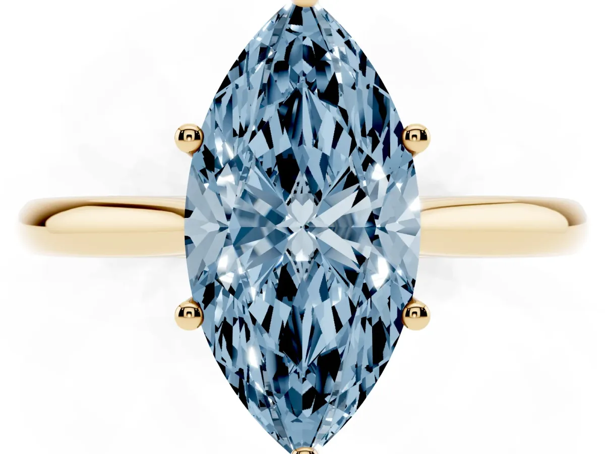 Fancy Blue Marquise Cut Cut Solitaire Ring with Cathedral Band and Four-Prong Setting Yellow gold