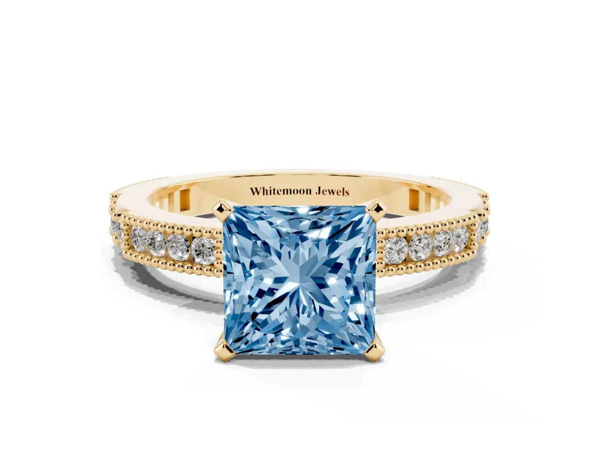 Fancy Blue Princess Cut Solitaire with Pavé Band and Four-Prong Setting Yellow gold