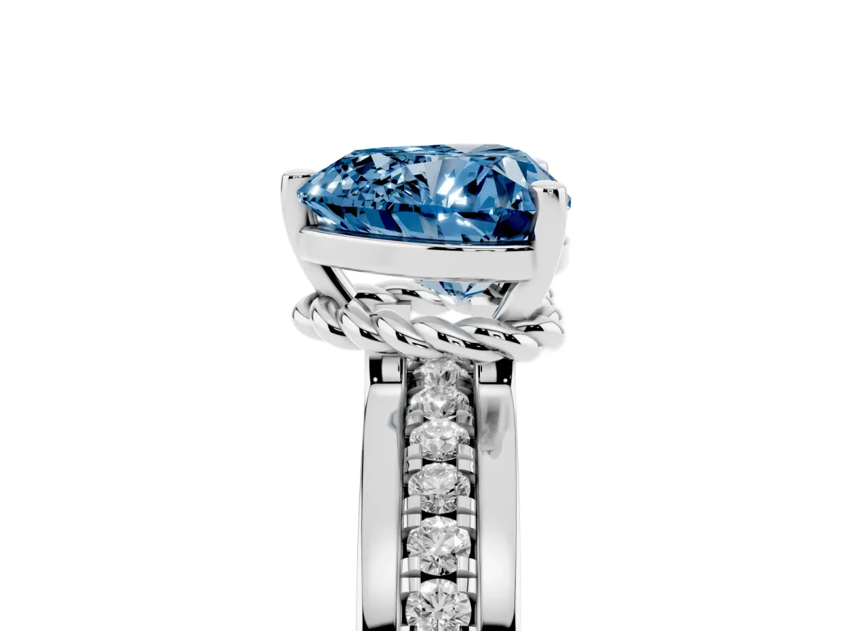 Fancy Blue Heart Cut Solitaire Diamond Ring with Channel Set Band and Six-Prong Setting Platinum