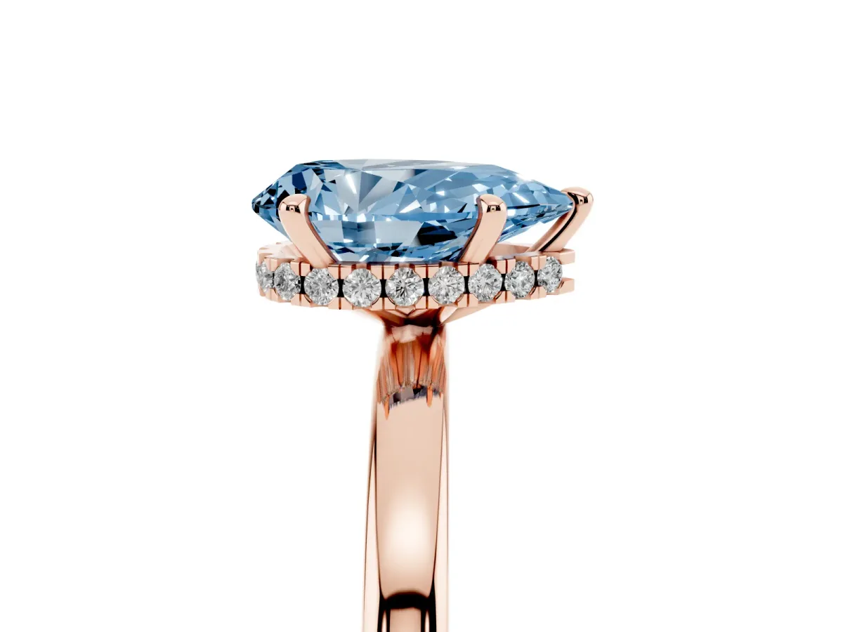 Fancy Blue Pear Cut Solitaire Engagement Ring with Cathedral Band and Four-Prong Setting Rose gold