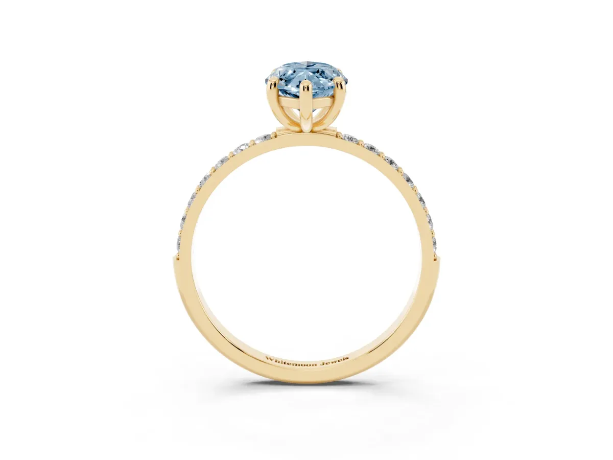 Fancy Blue Marquise Cut Diamond Solitaire Ring with Round Pavé Band and Prong Setting Yellow gold