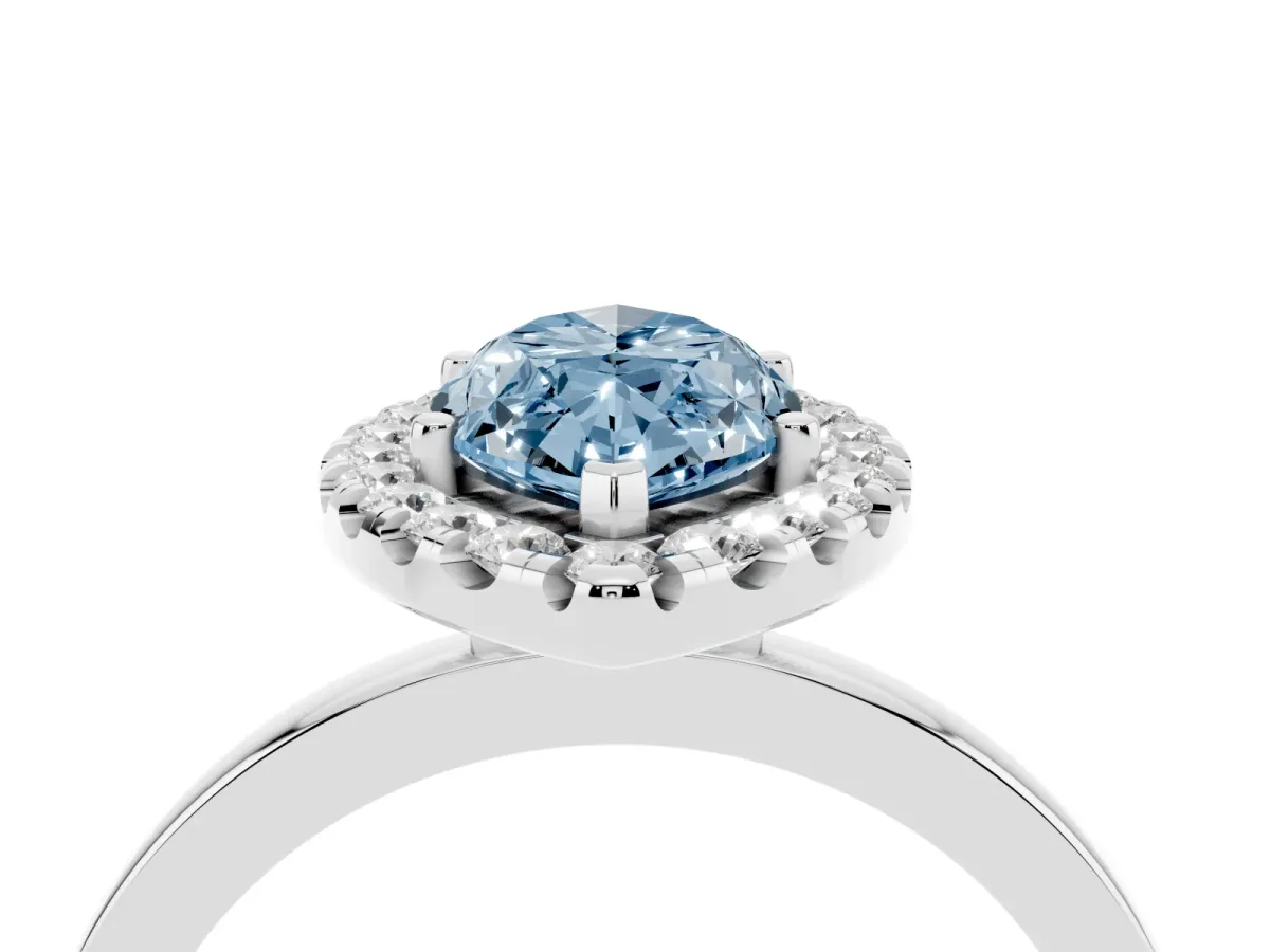 Fancy Blue Marquise Cut Halo Diamond Solitaire with Pavé Band and Four-Prong Setting White gold