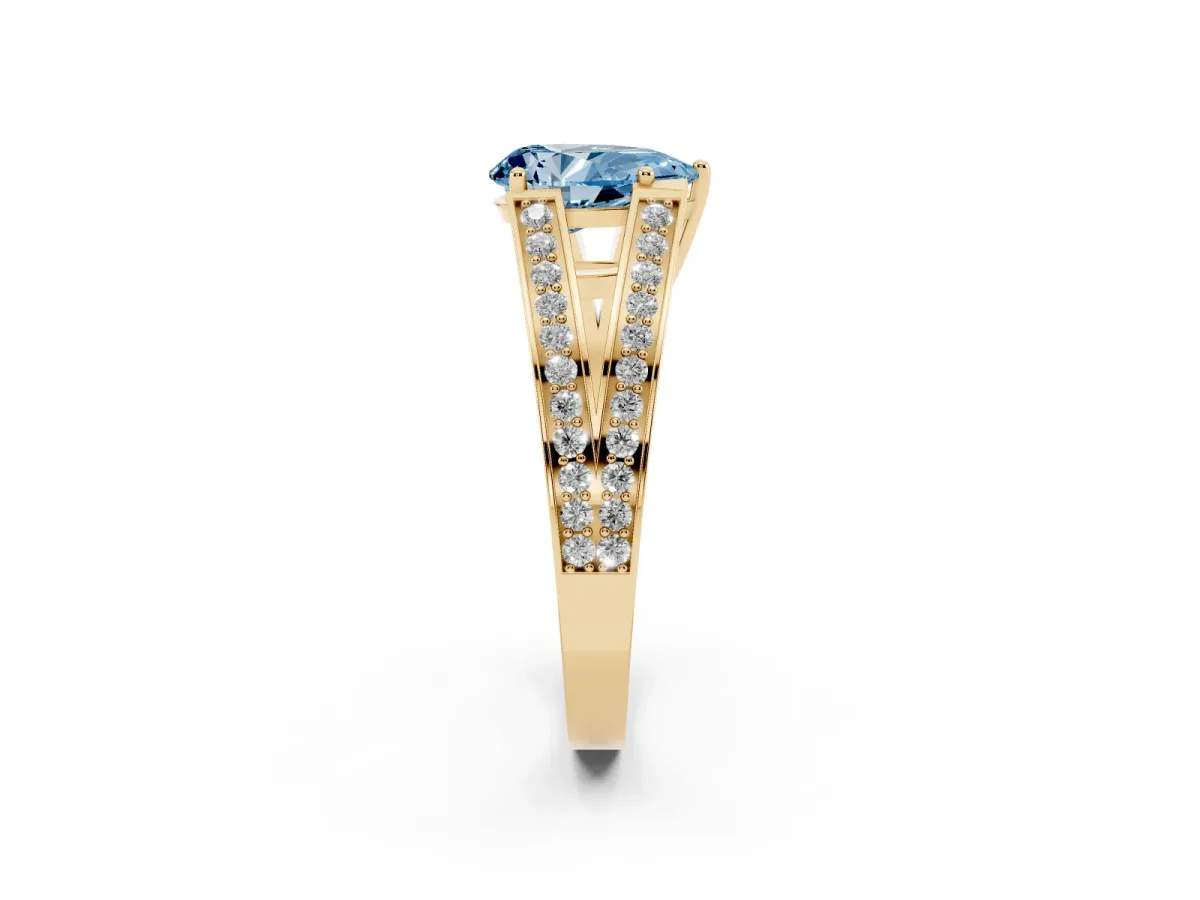 Fancy Blue Pear Cut Diamond Split Shank Ring with Pavé Band and Four-Prong Setting Yellow gold