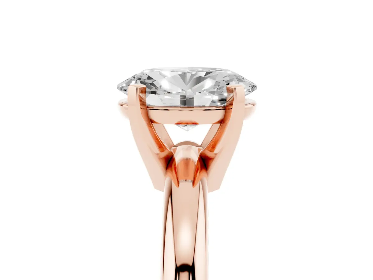 Oval Cut Diamond Solitaire Engagement Ring with Round Band and Four-Prong Setting Rose gold