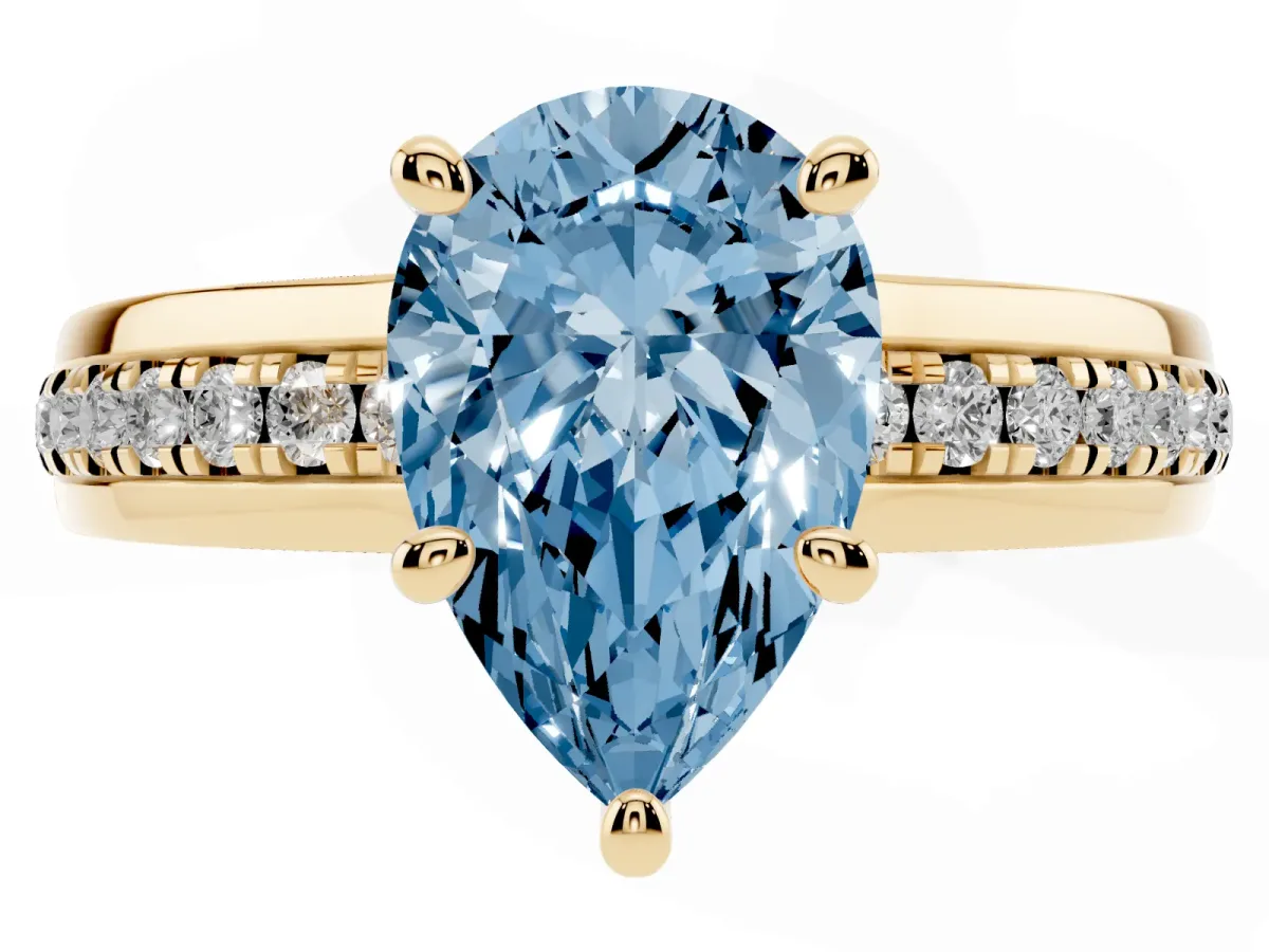 Fancy Blue Pear Cut Solitaire Diamond Ring with Channel Set Band and Six-Prong Setting Yellow gold