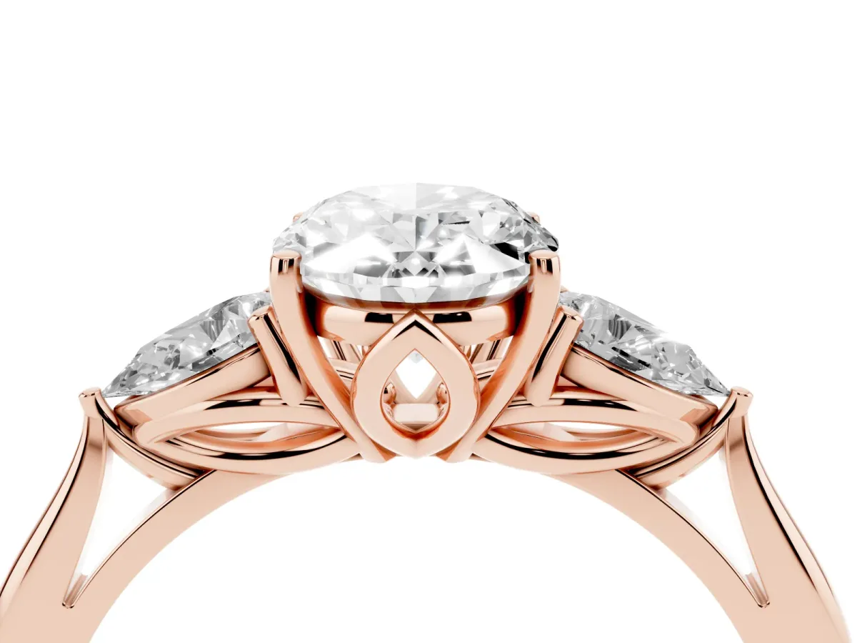 Oval Cut Diamond Three-Stone Ring with Pear Side Stones and Prong Setting Rose gold