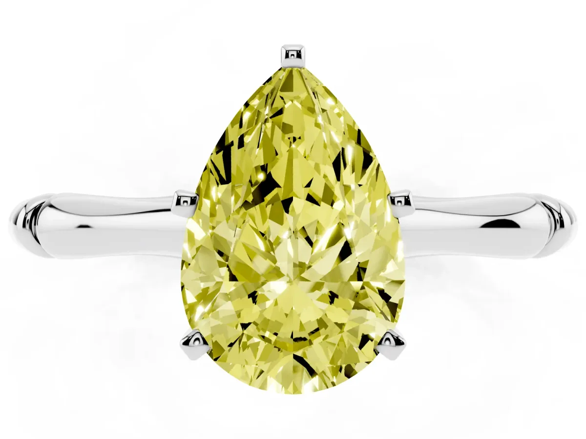 Fancy Yellow Pear Cut Solitaire Diamond Ring with Bamboo Band and Four-Prong Setting Silver