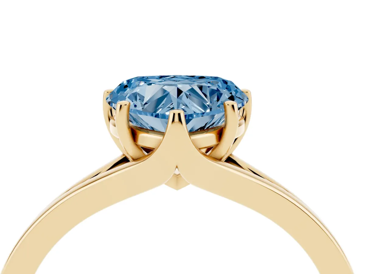 Fancy Blue Heart Cut Solitaire Diamond Ring with Six-Prong Setting and Tapered Band Yellow gold