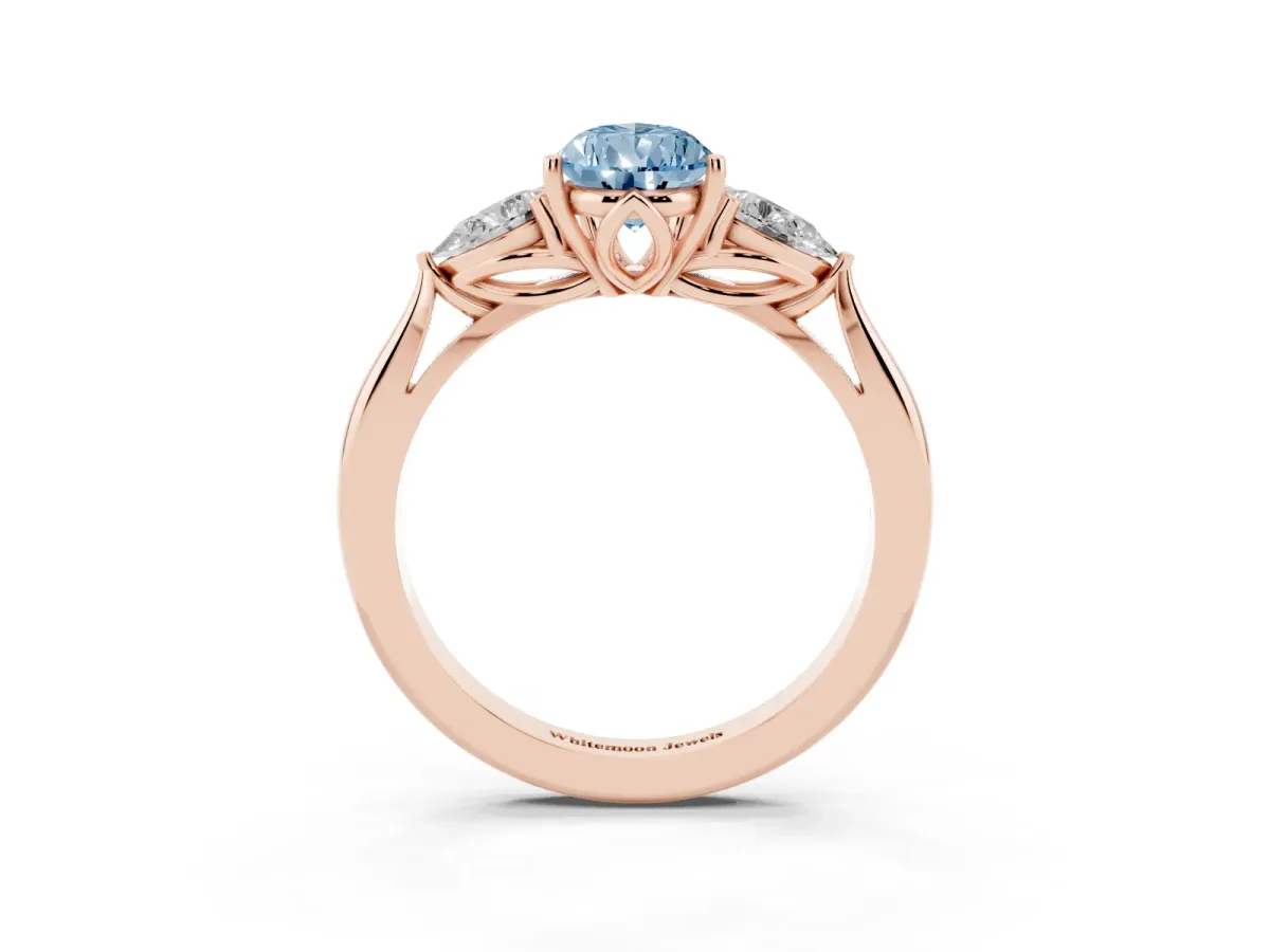 Fancy Blue Pear Cut Diamond Three-Stone Ring with Pear Side Stones and Prong Setting Rose gold