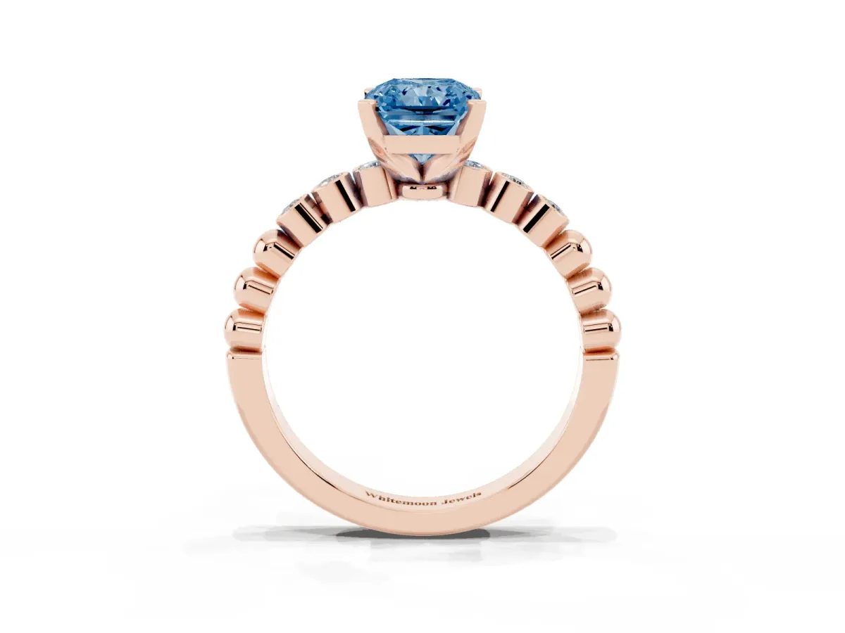 Fancy Blue Radiant Cut Solitaire Bezel Accent Diamond Engagement Ring with Beaded Band and Four-Prong Setting Rose gold
