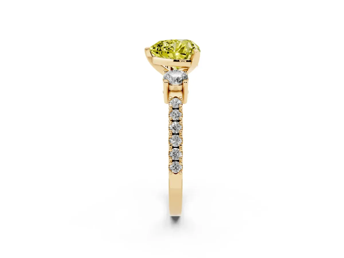 Fancy Yellow Heart Cut Three-Stone Diamond Pavé Band with Prong Setting Yellow gold