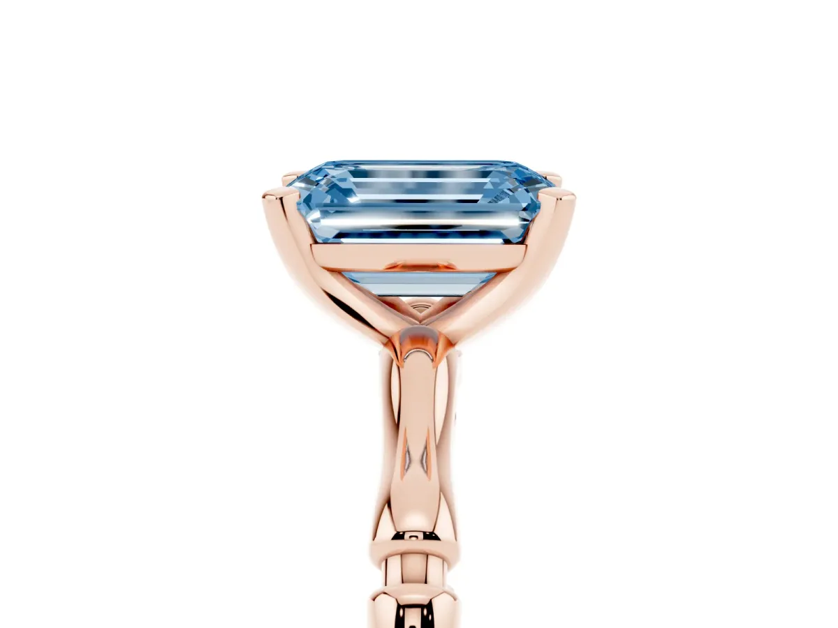 Fancy Blue Emerald Cut Solitaire Diamond Ring with Bamboo Band and Four-Prong Setting Rose gold