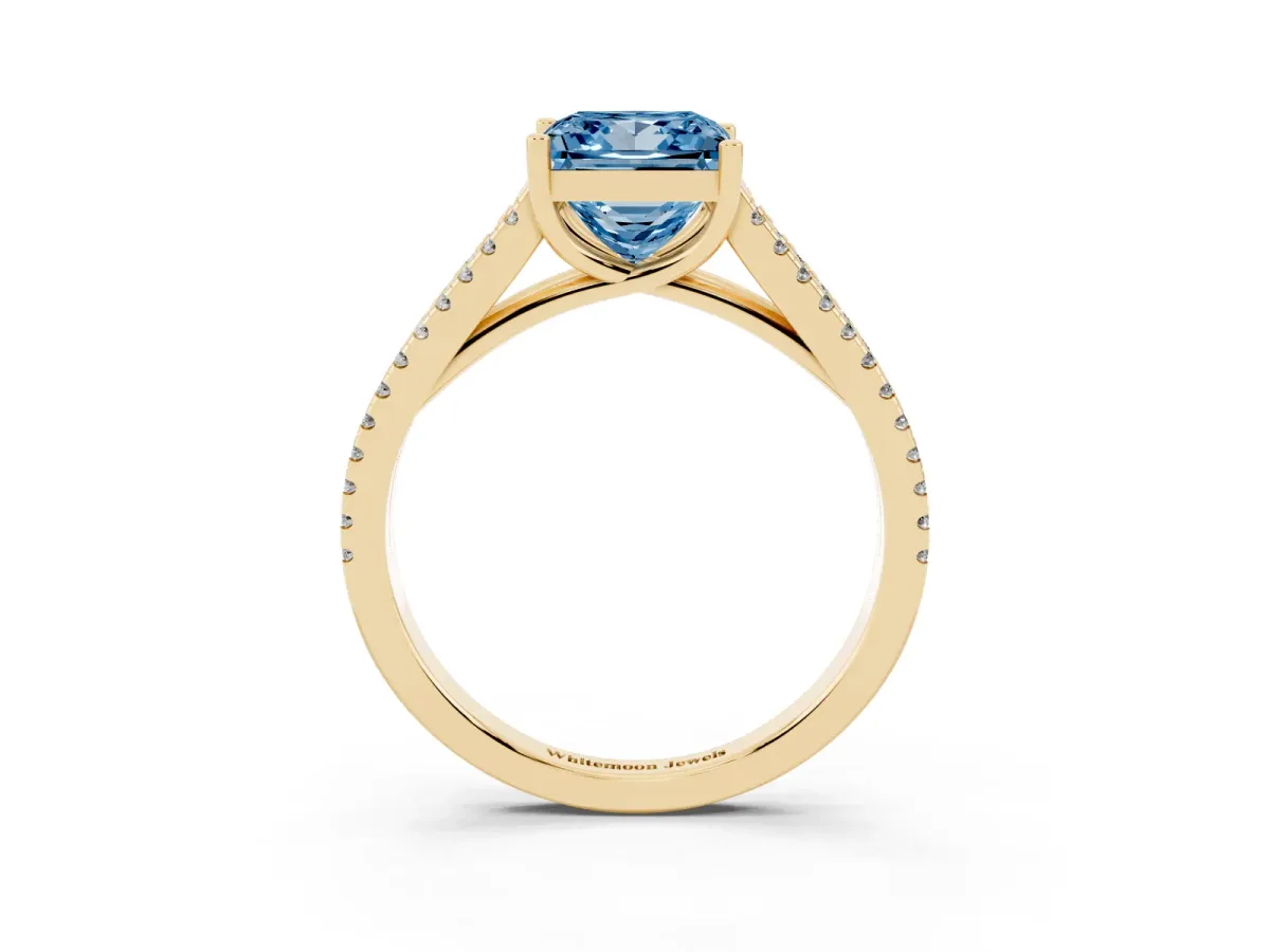 Fancy Blue Princess Cut Diamond Solitaire Engagement Ring with Split Shank Pavé Band Yellow gold