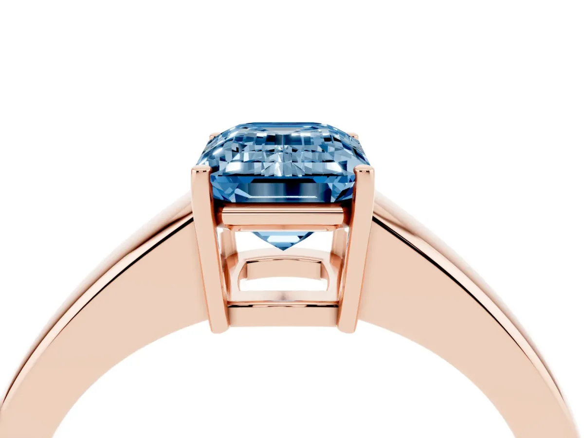 Fancy Blue Emerald Cut Solitaire Diamond Ring with Tapered Band and Four-Prong Setting Rose gold