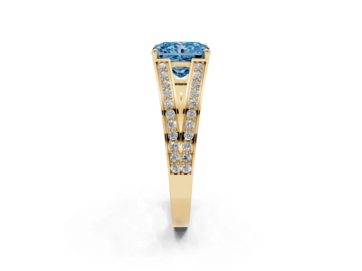Fancy Blue Radiant Cut Diamond Split Shank Ring with Pavé Band and Four-Prong Setting Yellow gold