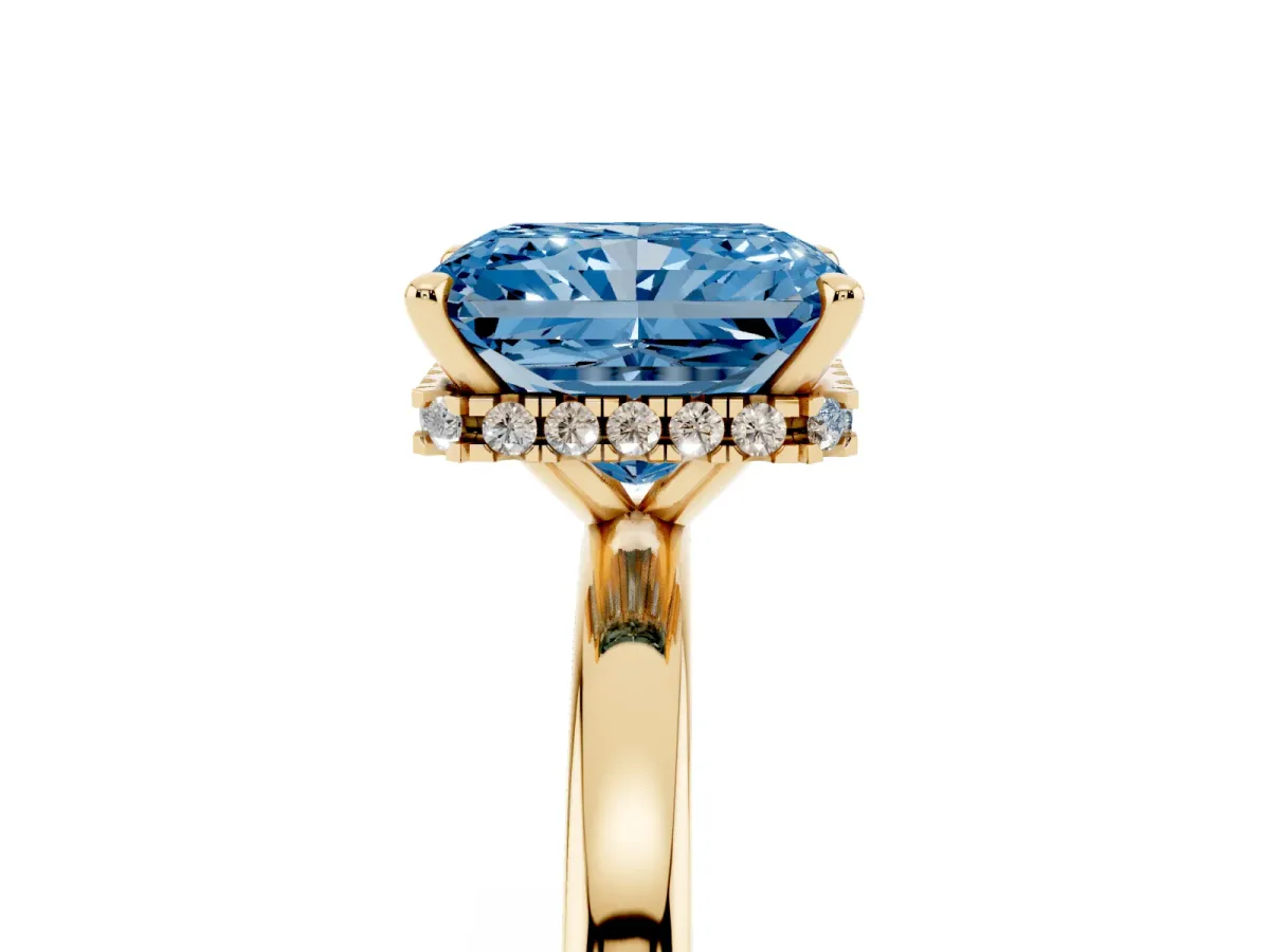 Fancy Blue Radiant Cut Solitaire Engagement Ring with Cathedral Band and Four-Prong Setting Yellow gold