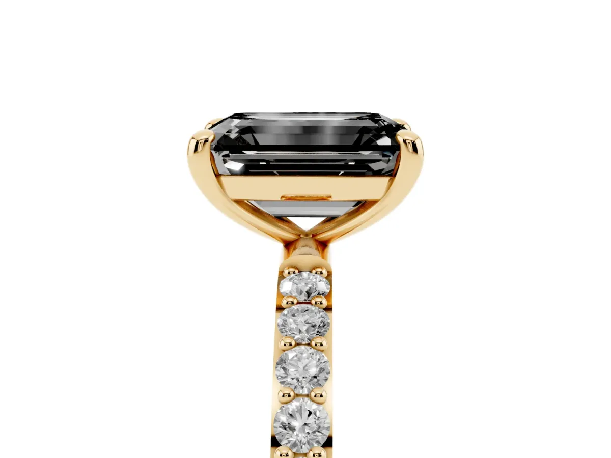 Fancy Black Emerald Cut Diamond Solitaire Ring with Round Pavé Band and Prong Setting Yellow gold