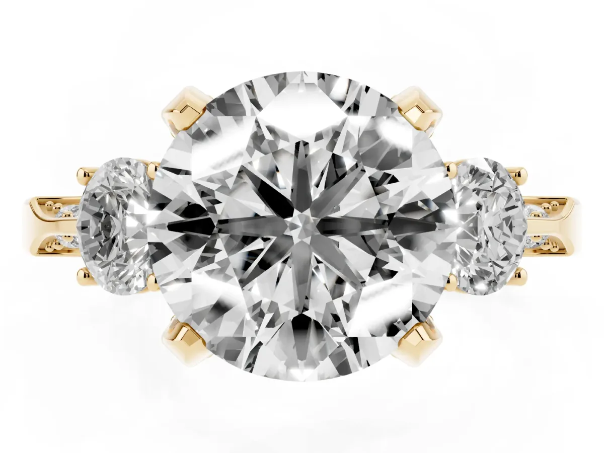 Round Cut Brilliant Three-Stone Diamond Ring with Pavé Band and Four-Prong Setting Yellow gold