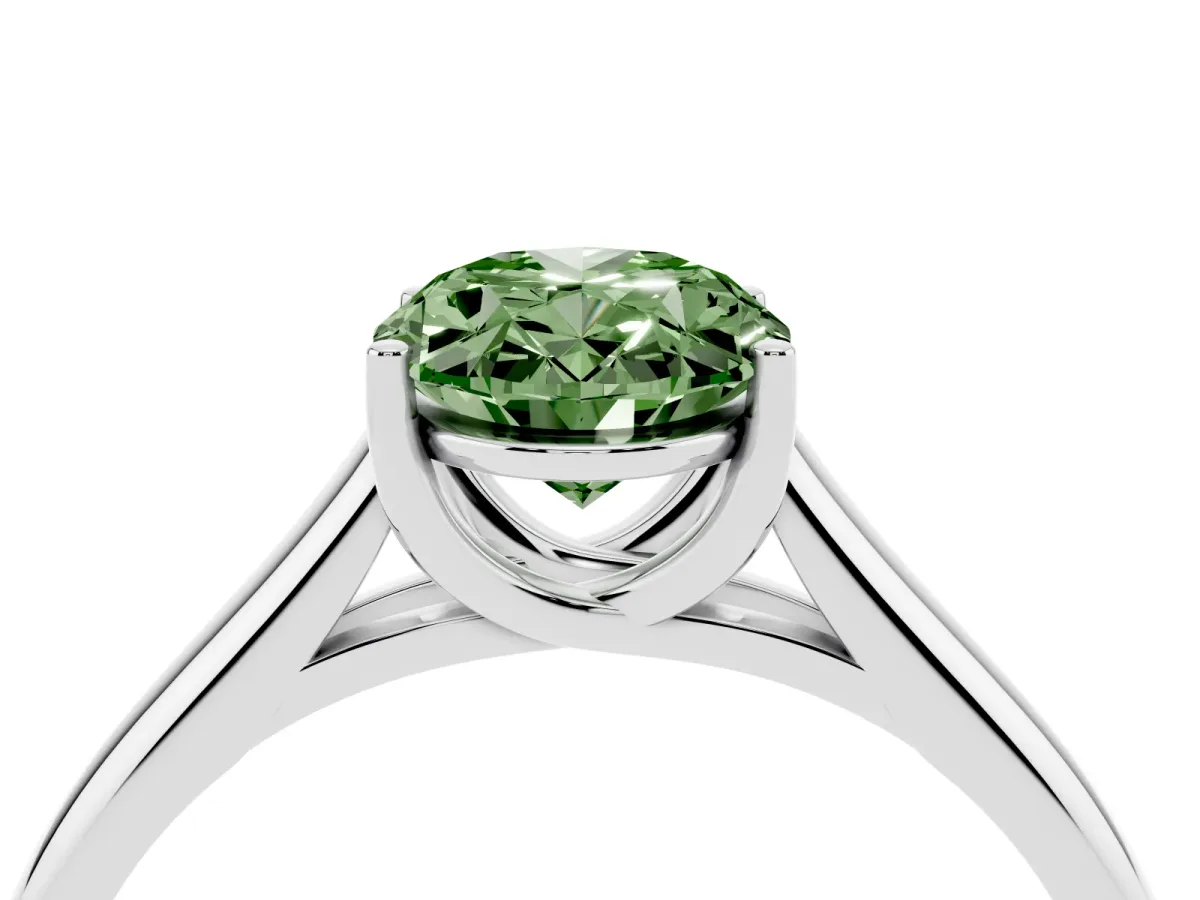 Fancy Green Oval Cut Solitaire Engagement Ring with Tapered Band and Four-Prong Setting Silver