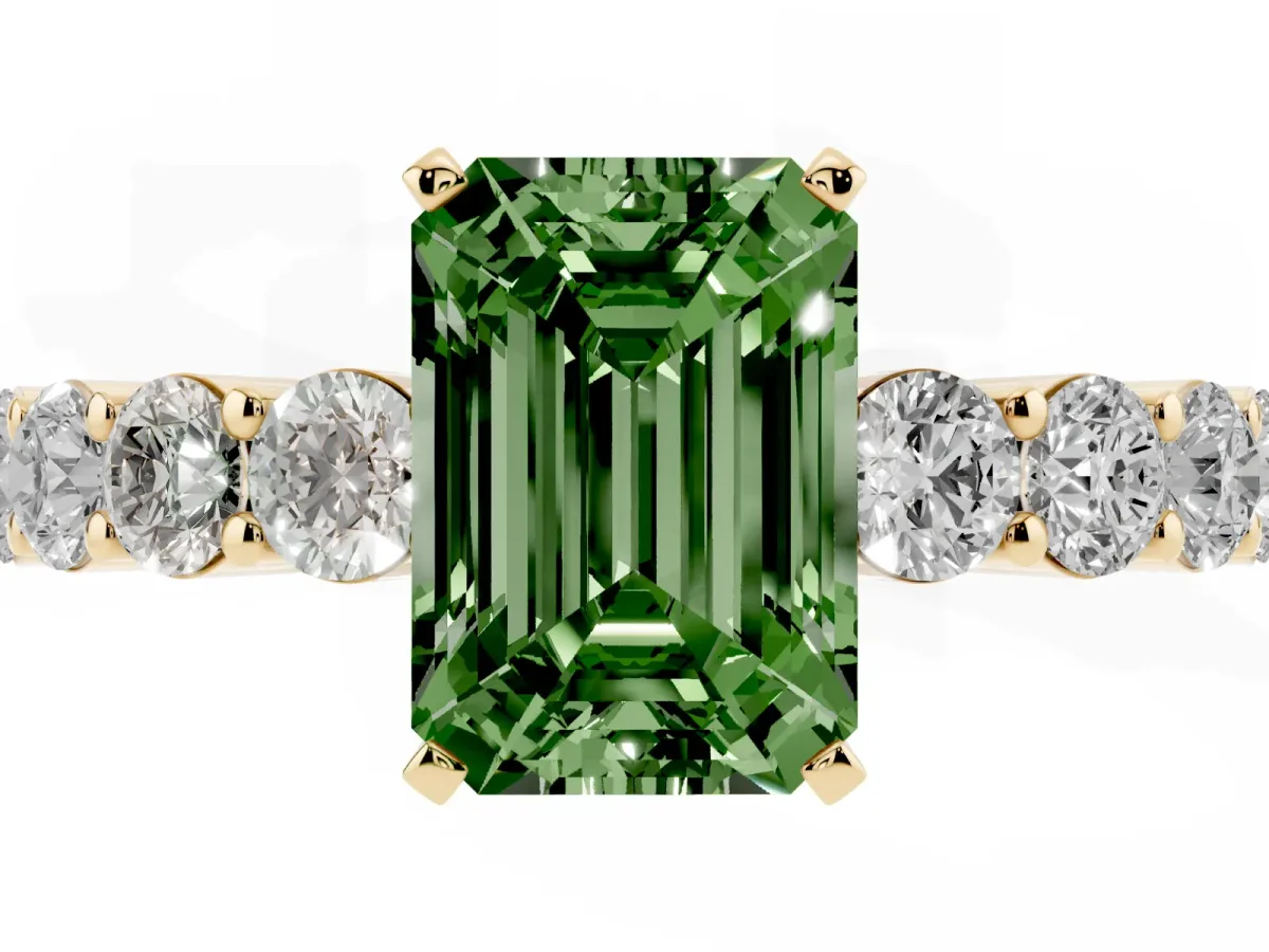 Fancy Green Emerald Cut Diamond Solitaire Ring with Shared Prong Round Side Stones Yellow gold