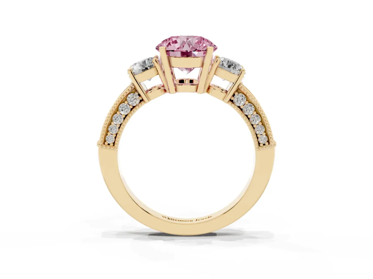 Fancy Pink Round Cut Three-Stone Diamond Ring with Pavé Band and Four-Prong Setting Yellow gold