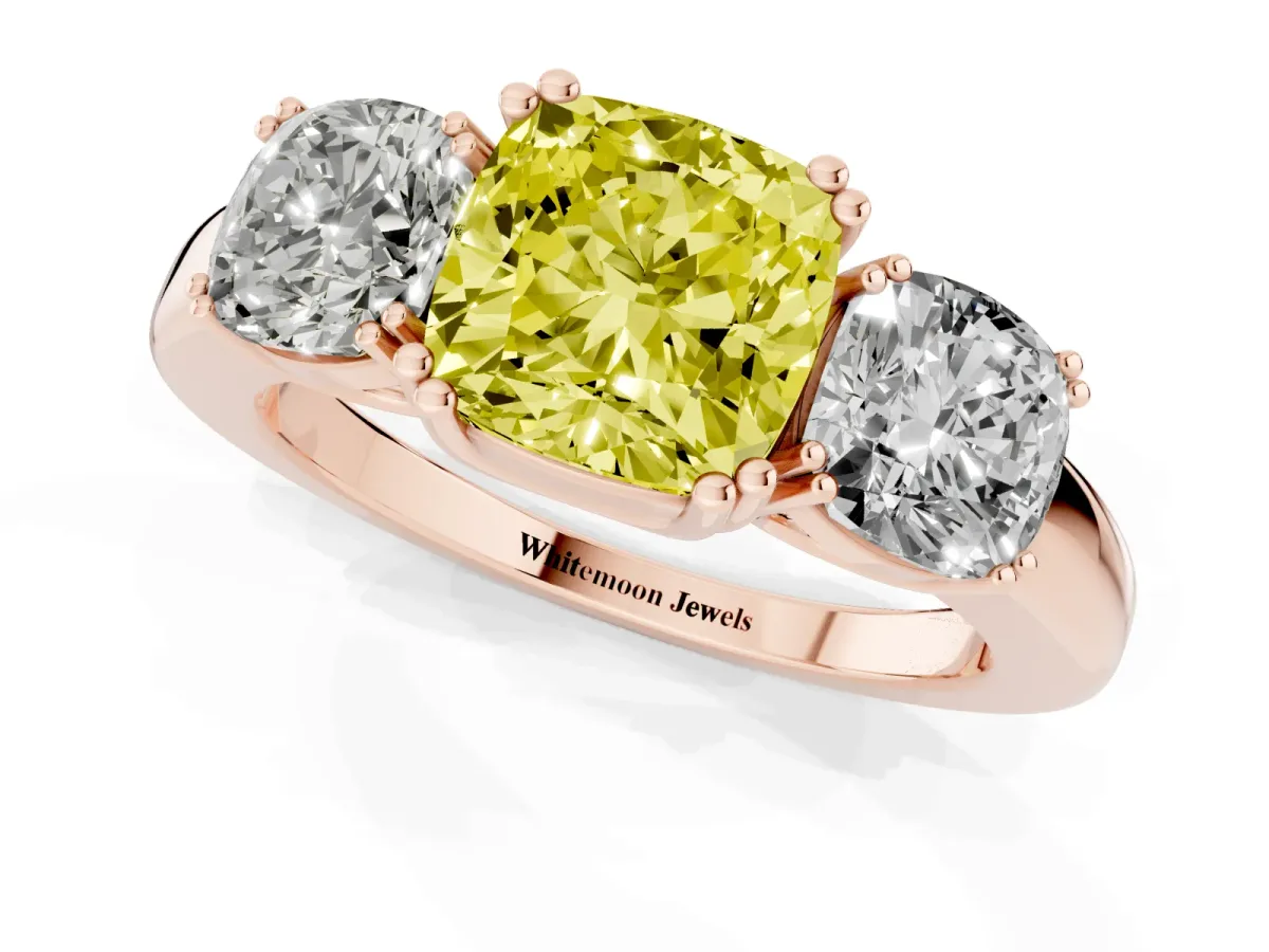Fancy Yellow Three-Stone Cushion Cut Cut Diamond Ring with Channel Set Band and Four-Prong Setting Rose gold