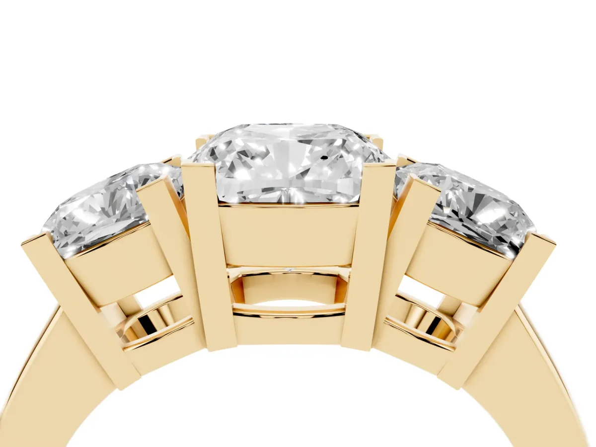 Three-Stone Cushion Cut Cut Diamond Ring with Channel Set Band and Four-Prong Setting Yellow gold