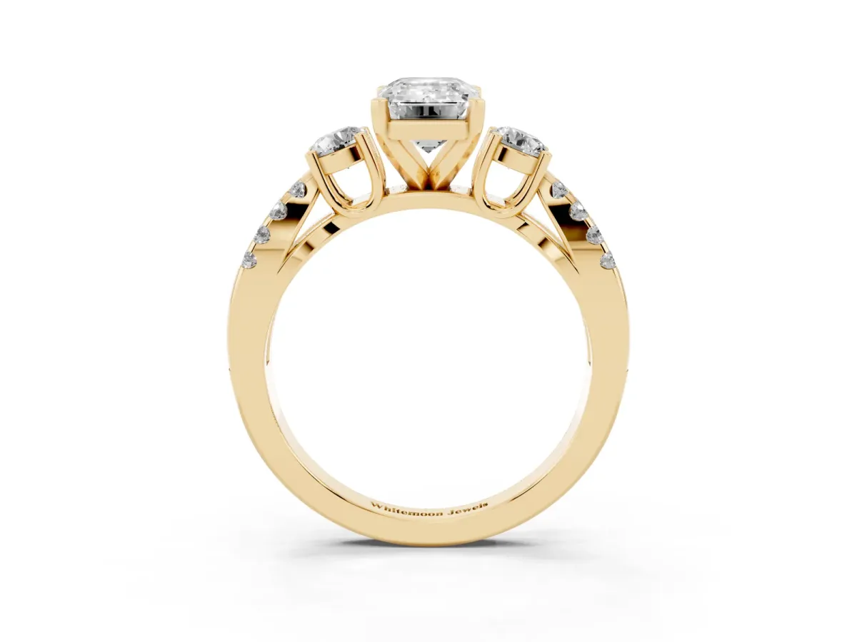 Emerald Cut Diamond Three-Stone Ring with Pavé Split Shank and Four-Prong Setting Yellow gold