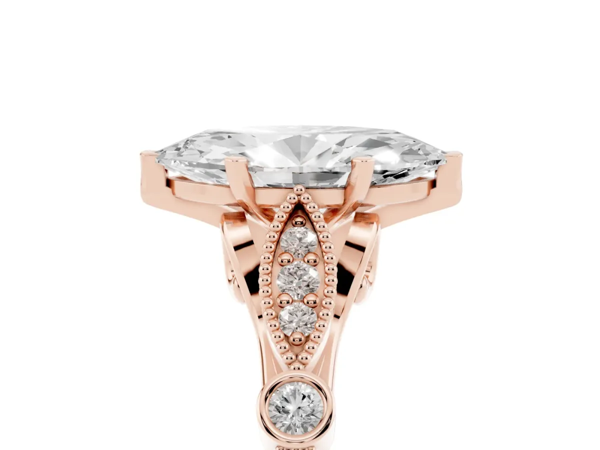 Marquise Cut Cut Diamond with Milgrain Marquise and Bezel Accents on a Solitaire Band with Prong Setting Rose gold
