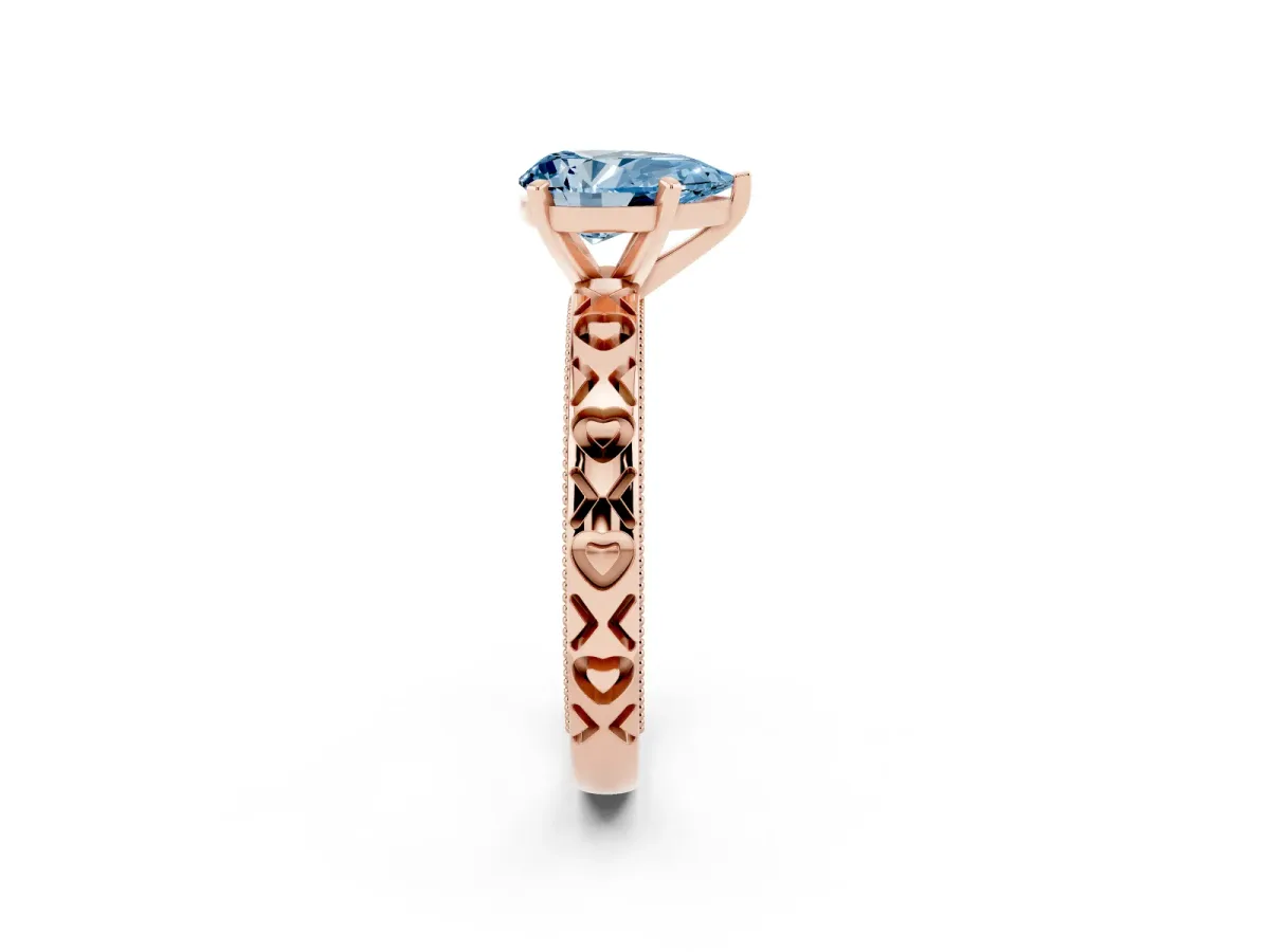 Fancy Blue Pear Cut Solitaire Diamond Engagement Ring with XO Engraved Band and Four-Prong Setting Rose gold
