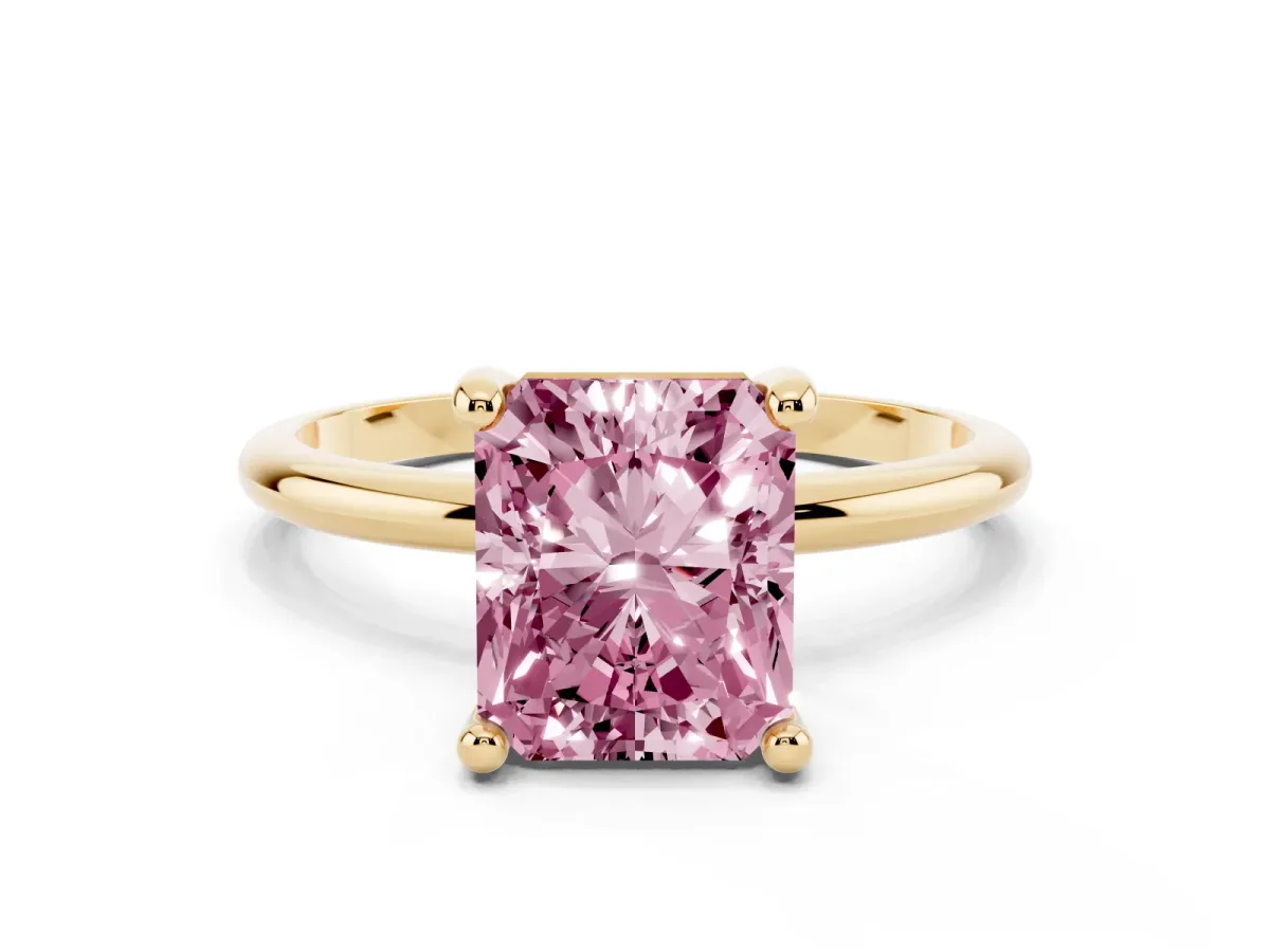 Fancy Pink Radiant Cut Solitaire Diamond Ring with 4-Prong Setting on a Classic Band Yellow gold