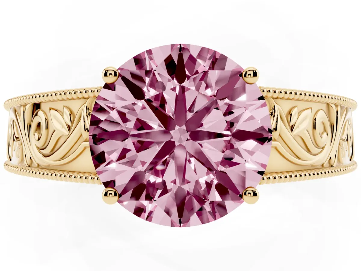 Fancy Pink Round Cut Diamond Solitaire Ring with Engraved Band and Four-Prong Setting Yellow gold