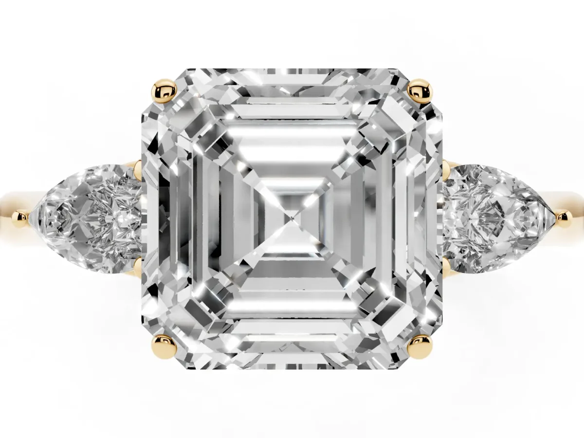 Asscher Cut Diamond Three-Stone Ring with Pear Side Stones and Prong Setting Yellow gold