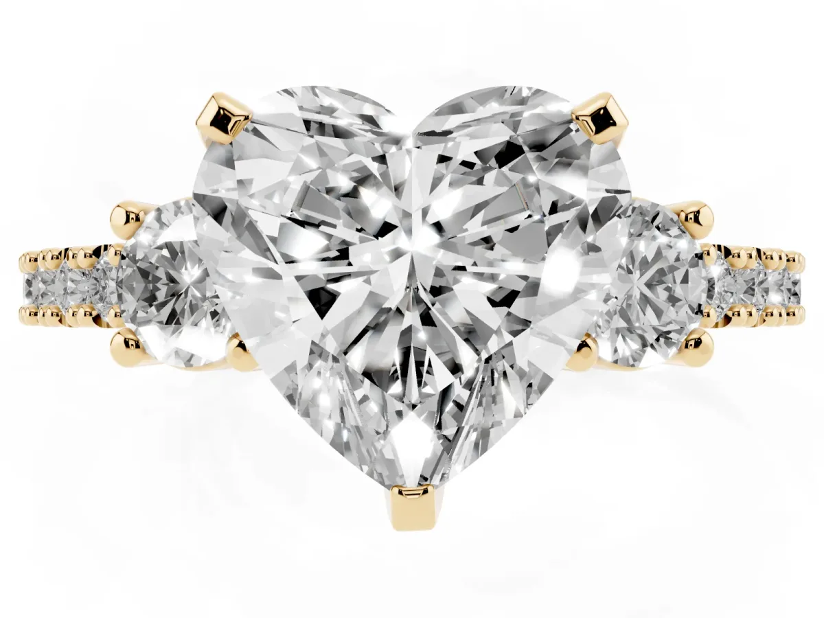 Heart Cut Three-Stone Diamond Pavé Band with Prong Setting Yellow gold