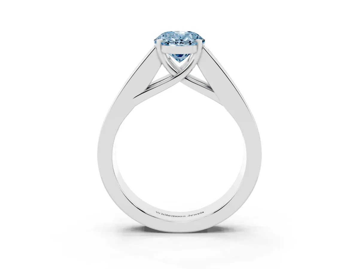 Fancy Blue Oval Cut Cut Channel Set Solitaire Ring with Four-Prong Setting White gold