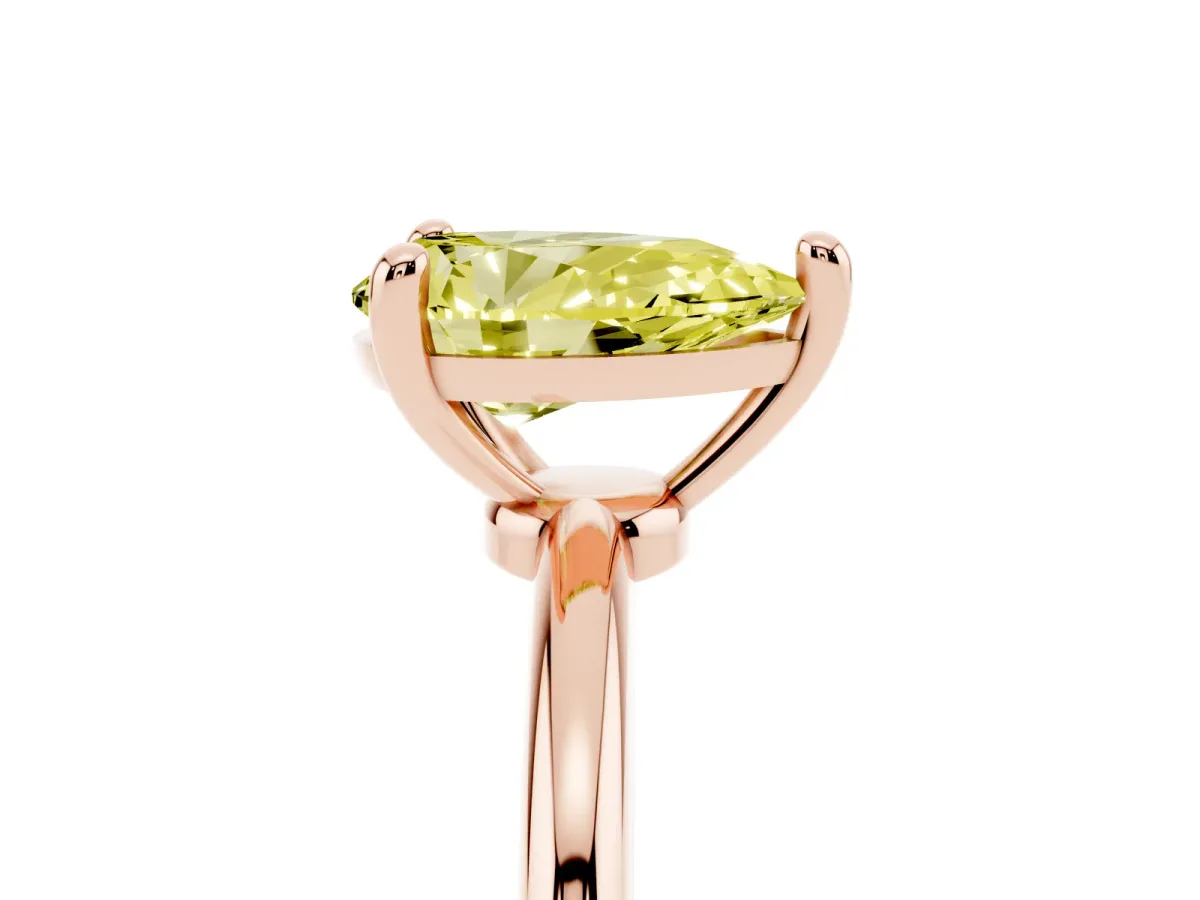 Fancy Yellow Pear Cut Solitaire Diamond Ring with 4-Prong Setting on a Classic Band Rose gold