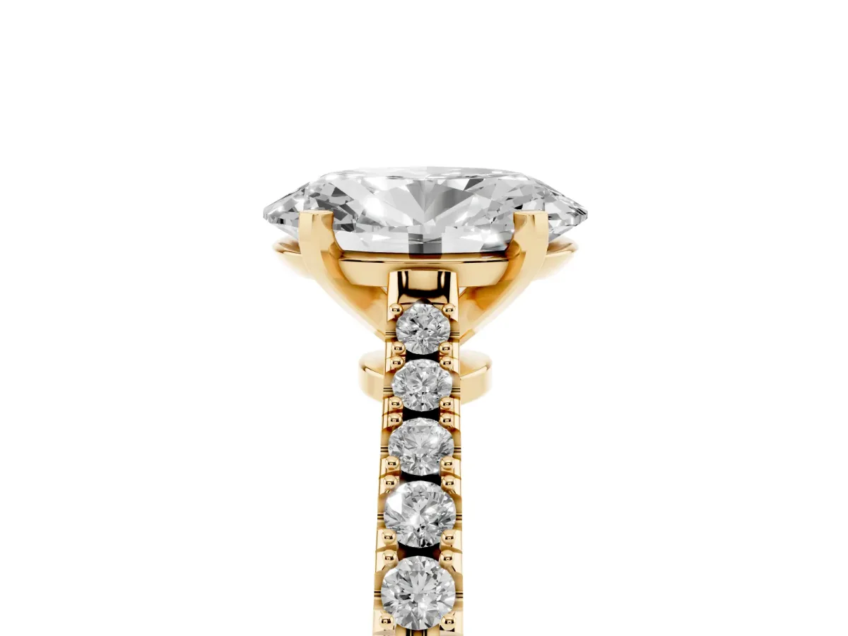 Oval Cut Cut Solitaire Diamond Engagement Ring with Pave Band and Four-Prong Setting Yellow gold