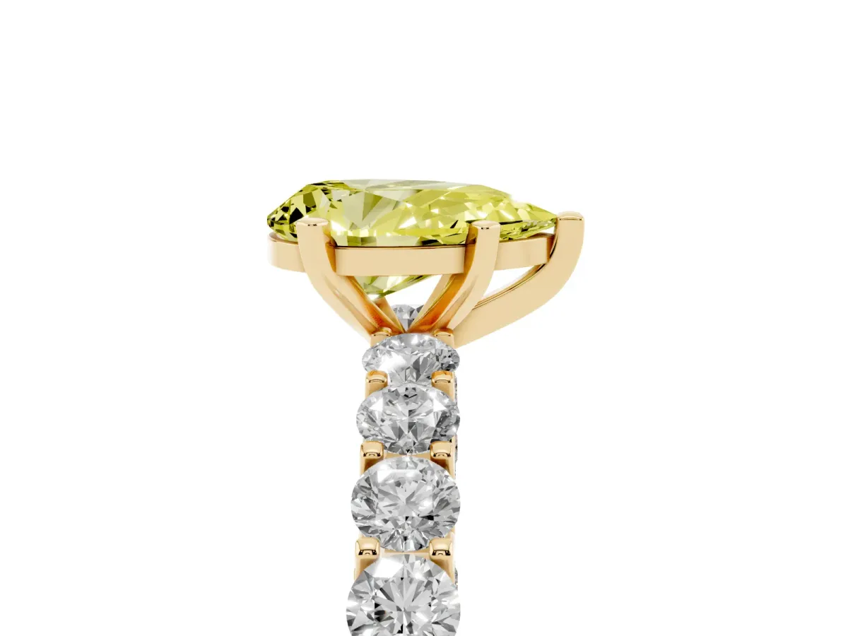 Fancy Yellow Pear Cut Diamond Solitaire Ring with Shared Prong Pavé Band and Four-Prong Setting Yellow gold