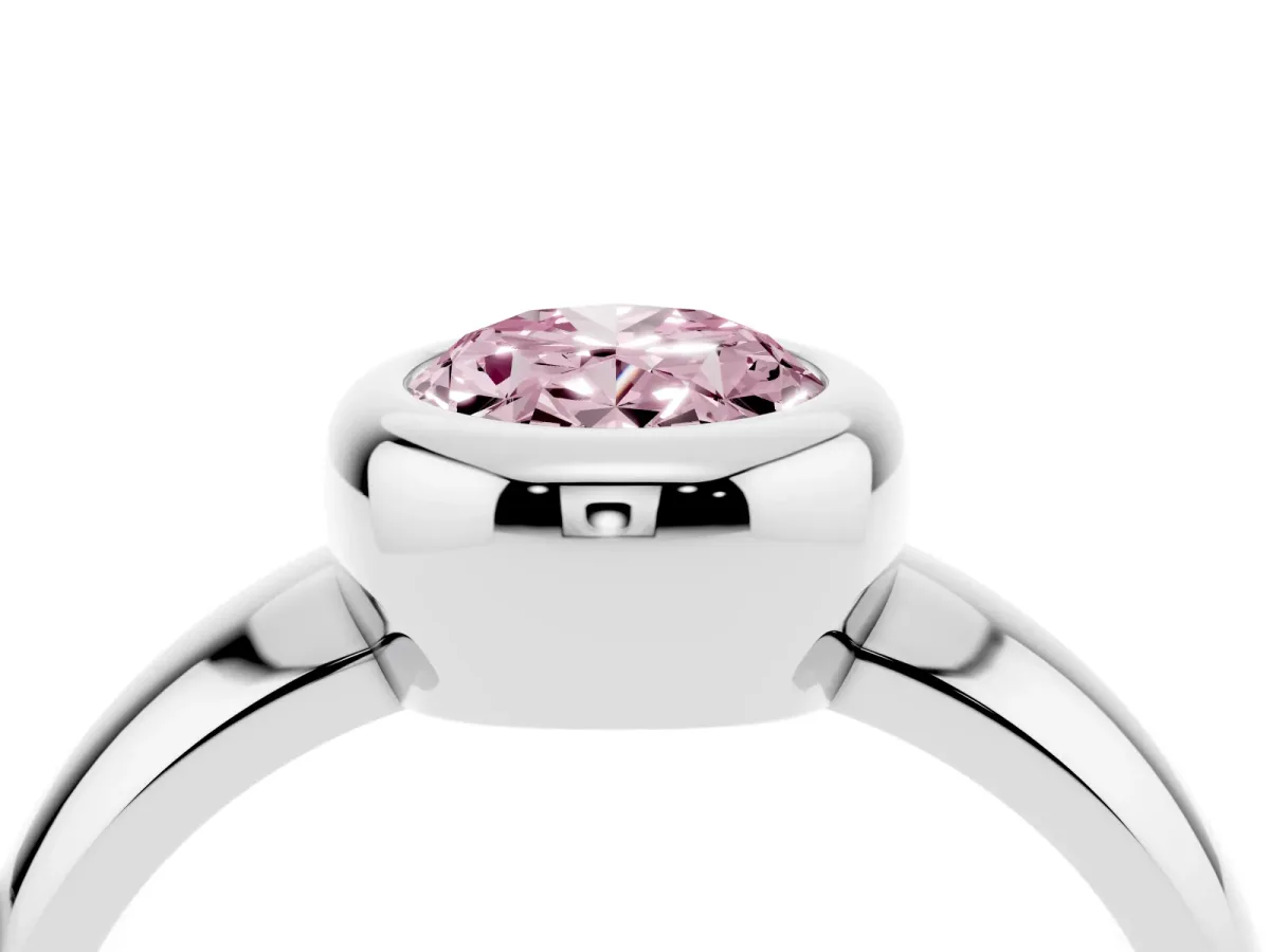 Fancy Pink Bezel Set Oval Cut Solitaire Ring with Wide Band Platinum