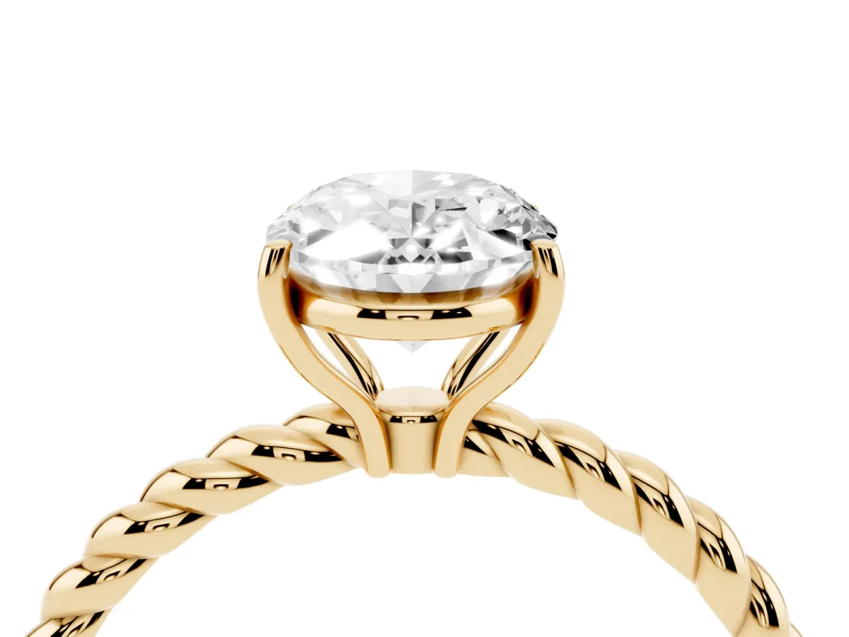 Oval Cut Solitaire Twist Band Ring with Four-Prong Setting Yellow gold