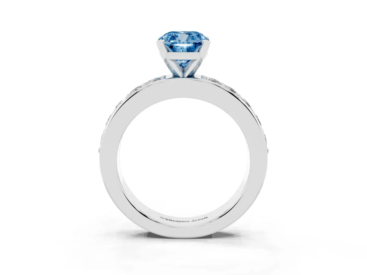 Fancy Blue Cushion Cut Diamond Engagement Ring with Channel Set Round Band and Prong Setting Silver