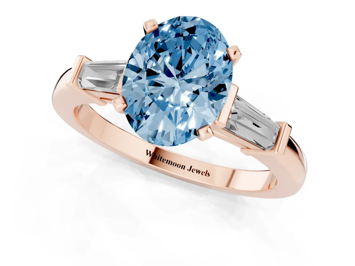 Fancy Blue Oval Cut Cut Diamond Solitaire Ring with Tapered Baguette Accents and Four-Prong Setting Rose gold